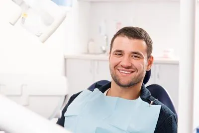 man smiling during his dental appointment at Jay Zimmerman Dentistry in Mountainside, NJ