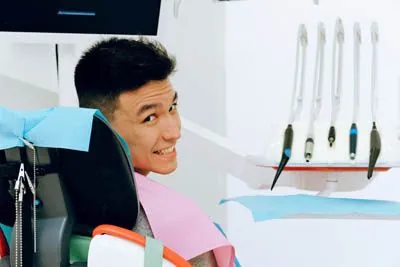 man sitting in the dental chair at Jay Zimmerman Dentistry in Mountainside, NJ