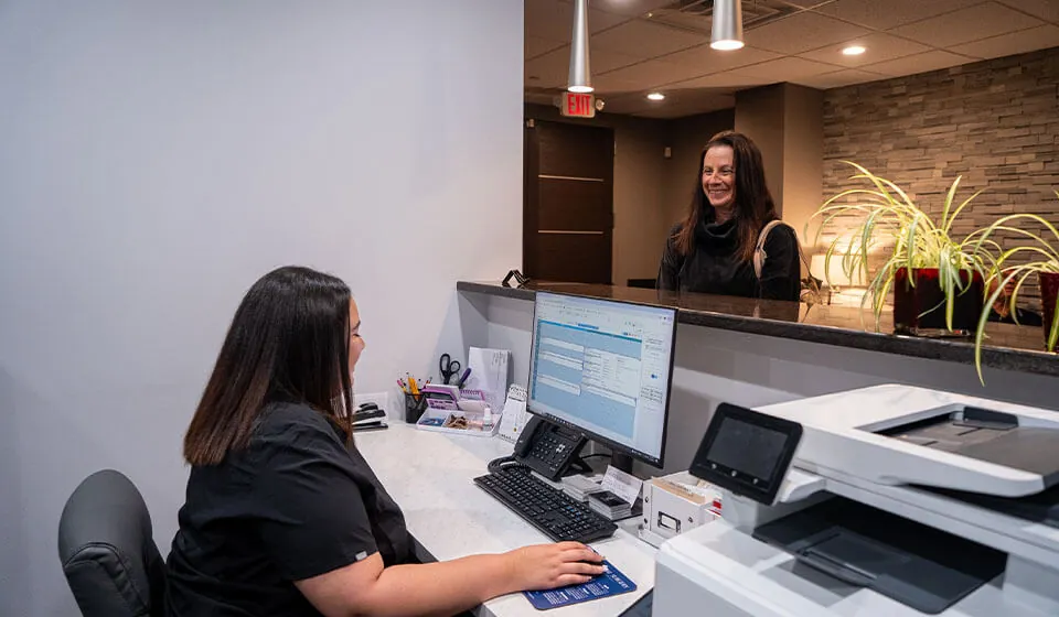A patient checking in at Dr Jay Zimmerman Dentistry in Mountainside NJ.