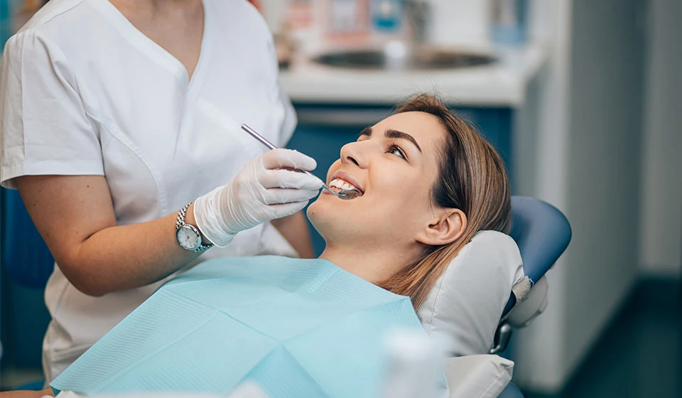 woman receiving dental care at Mountainside, NJ dental office Jay Zimmerman Dentistry