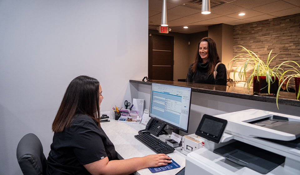 A patient checking in at Dr Jay Zimmerman Dentistry in Mountainside NJ.